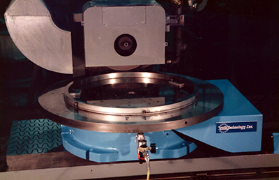 A rotary grinding table attached to a surface grinding machine